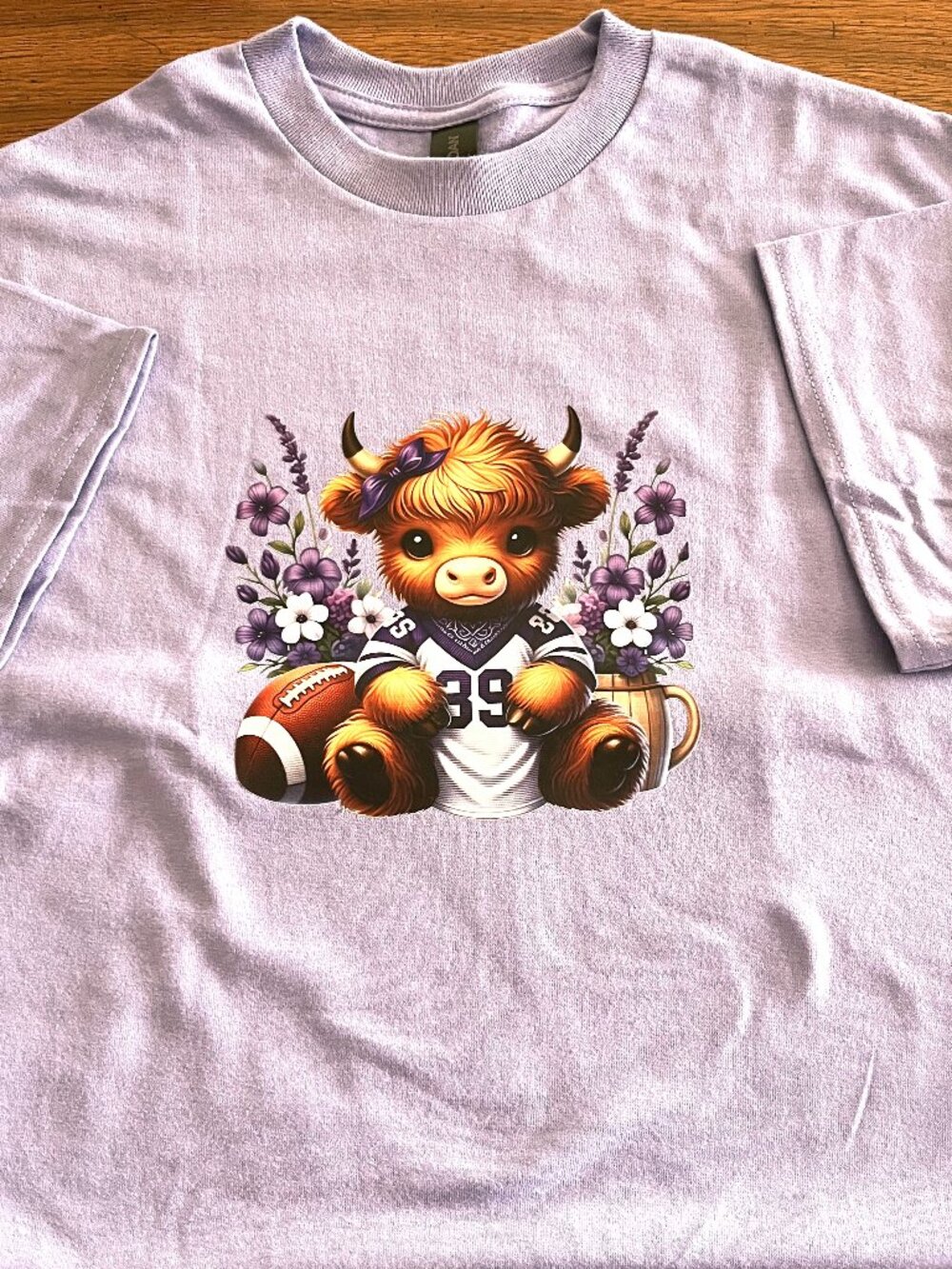 Highland Cow Football Lavender Size Medium Women